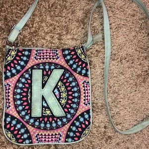 “K” embroidered crossbody bag